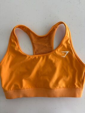 Gymshark Orange Racerback Sports Bra with White Logo